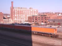Schneider National trailers moving a BNSF intermodal train in Kansas City