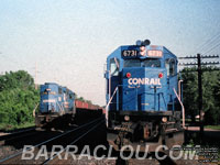 CR 6731 - SD50 (To CSXT 8655, then CSXT SD50-2 2486) and 7715 - GP38 (To GMTX GP38-2 2614)