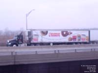Bad picture of a Dunkin' Donuts truck