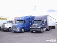 Two Freightliner and a Volvo