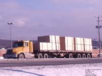 Softwood lumber loaded on a flatbed trailer