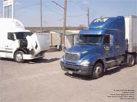 Volvo and Freightliner trucks